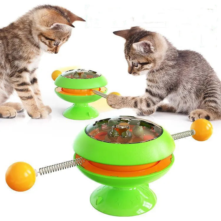 Rotatable plastic cat toy with turntable and catnip balls in a choice of colours.