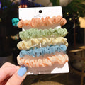 Children's 20-piece hair ring set showing autumn colours and macaron tone options