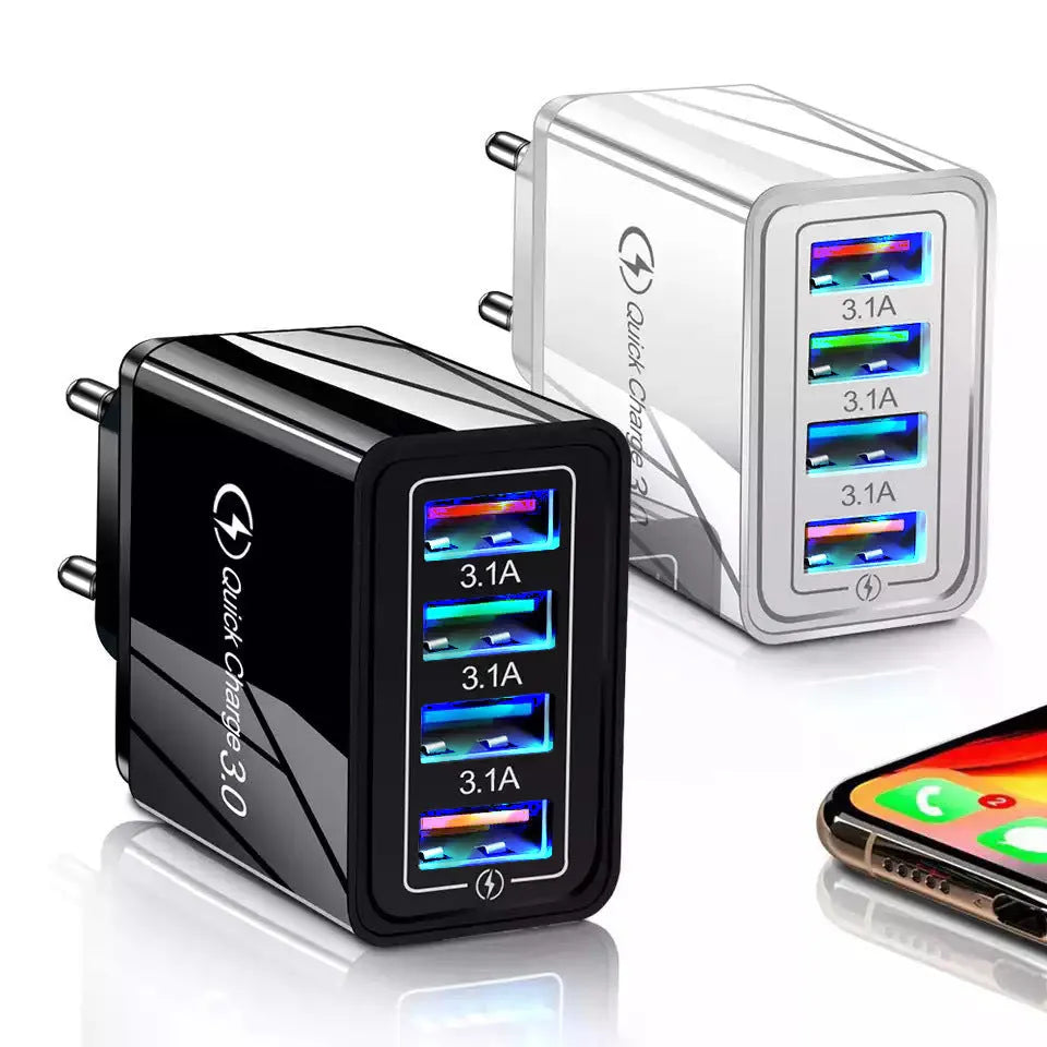 Compact luminous 4-port USB travel charger plug in dark blue colour, showing EU plug and LED light.