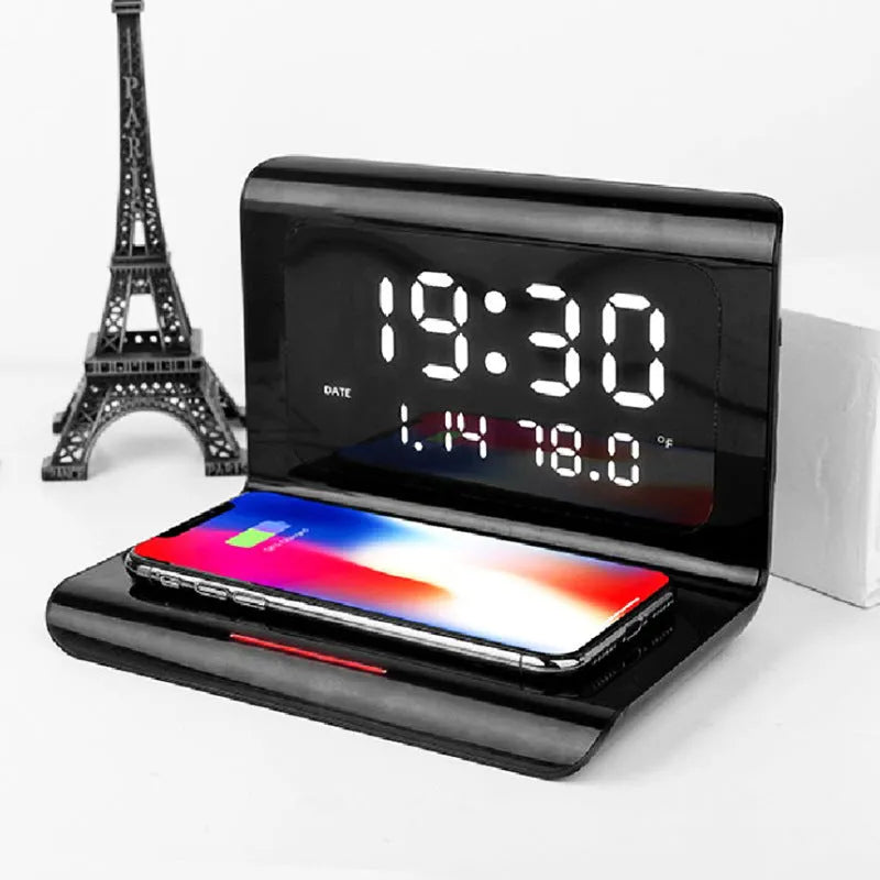 Wireless charger alarm clock with digital display showing time, calendar, temperature and humidity readings