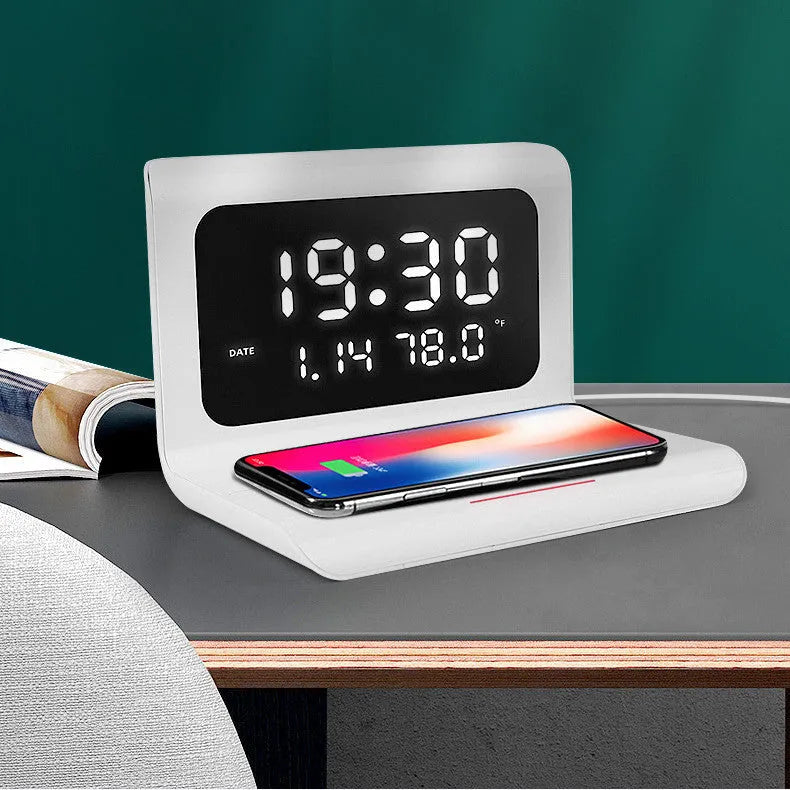 Wireless charger alarm clock with digital display showing time, calendar, temperature and humidity readings