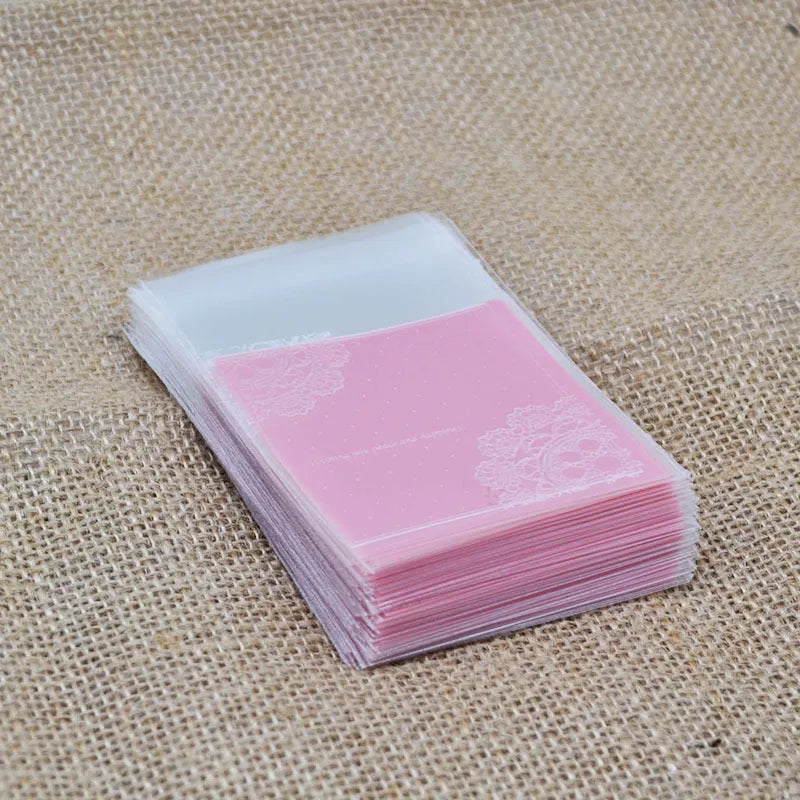 Pink self-adhesive plastic packaging bags for handmade soap measuring 7x7cm with 3cm flap