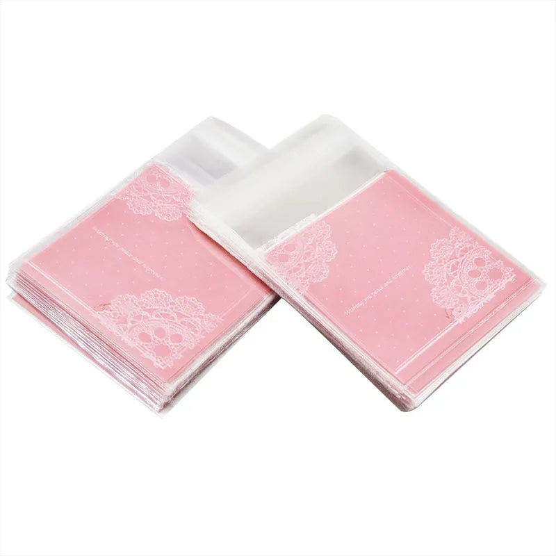 Pink self-adhesive plastic packaging bags for handmade soap measuring 7x7cm with 3cm flap