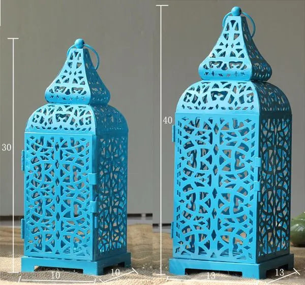 Geometric hollow metal candelabra in retro design for tabletop decoration.