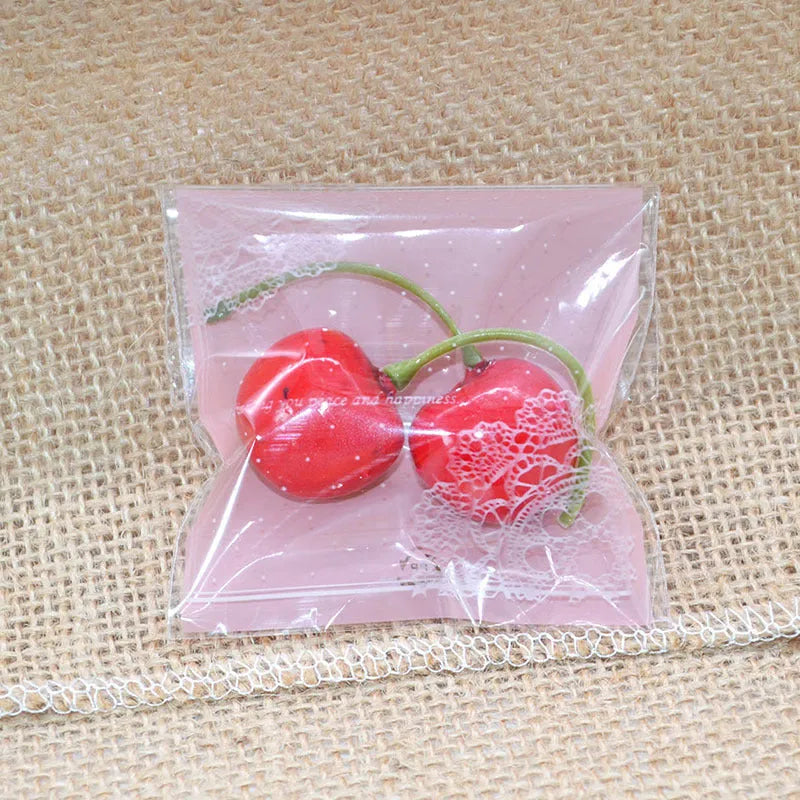 Pink self-adhesive plastic packaging bags for handmade soap measuring 7x7cm with 3cm flap