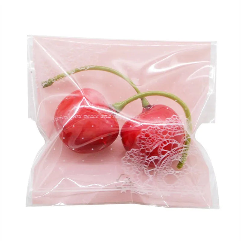 Pink self-adhesive plastic packaging bags for handmade soap measuring 7x7cm with 3cm flap
