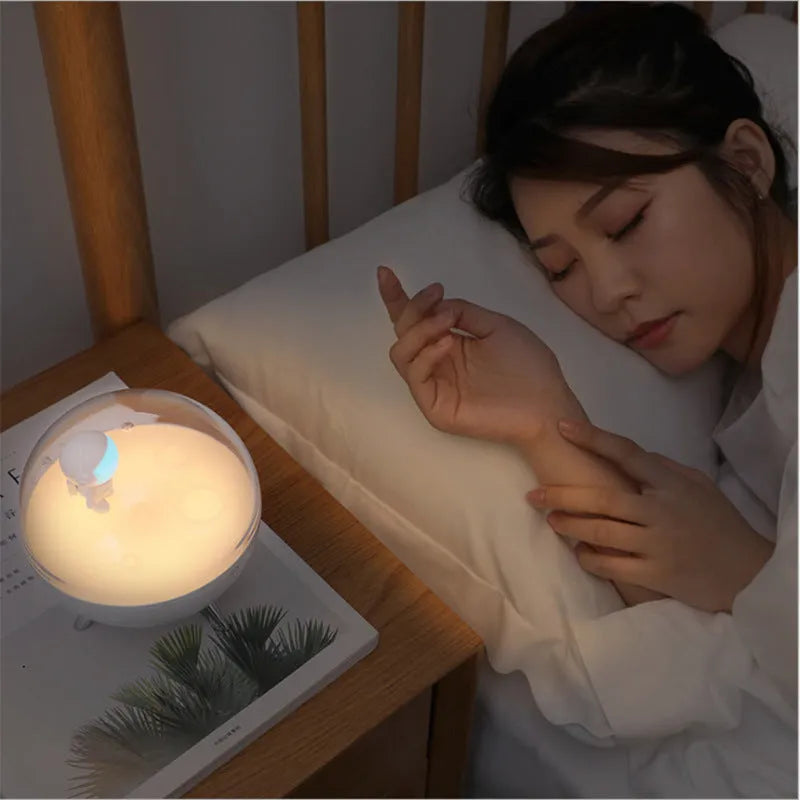 Cartoon guardian design USB night light with white and blue light options on desk