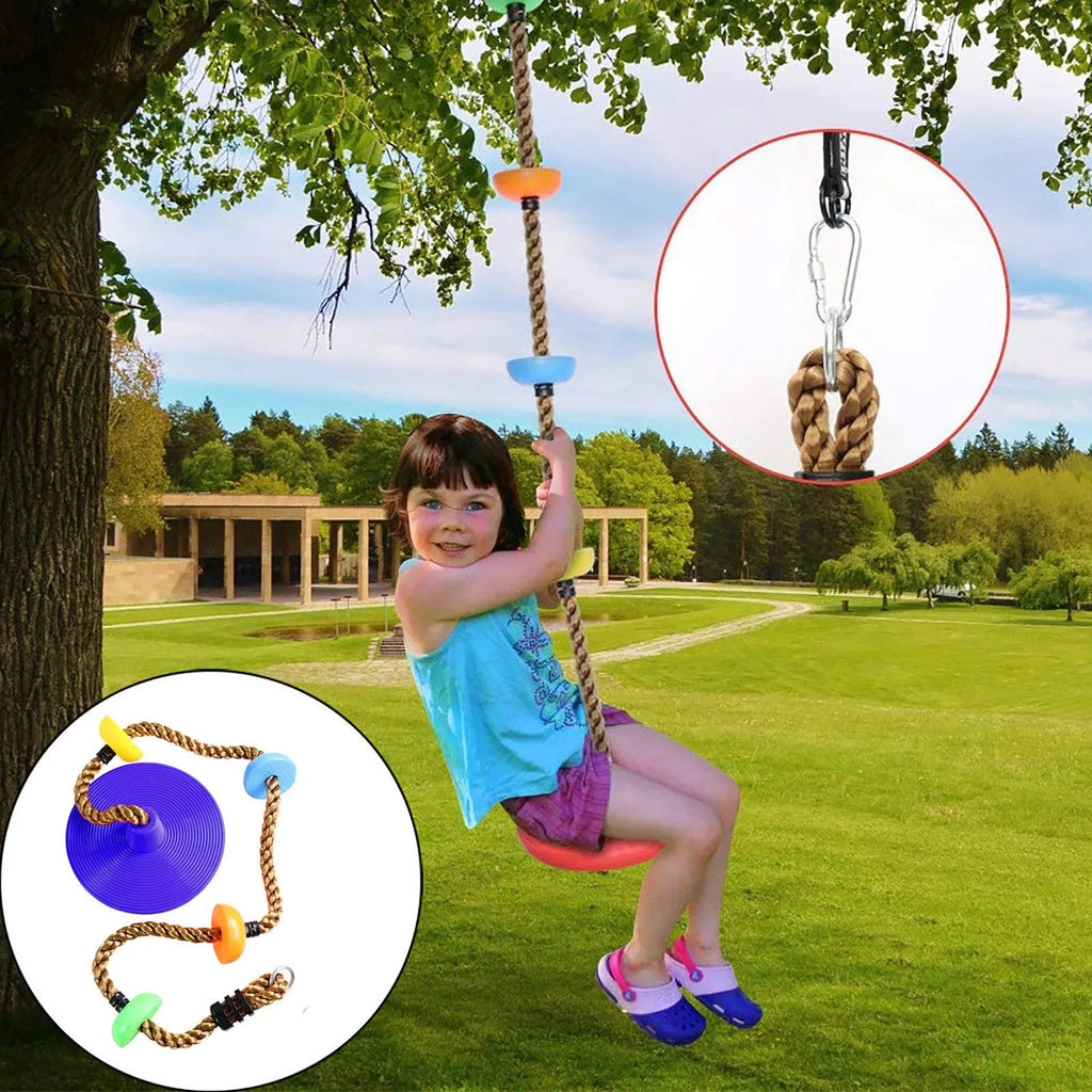Plastic children's swing set with four colourful platforms on a climbing rope in a backyard