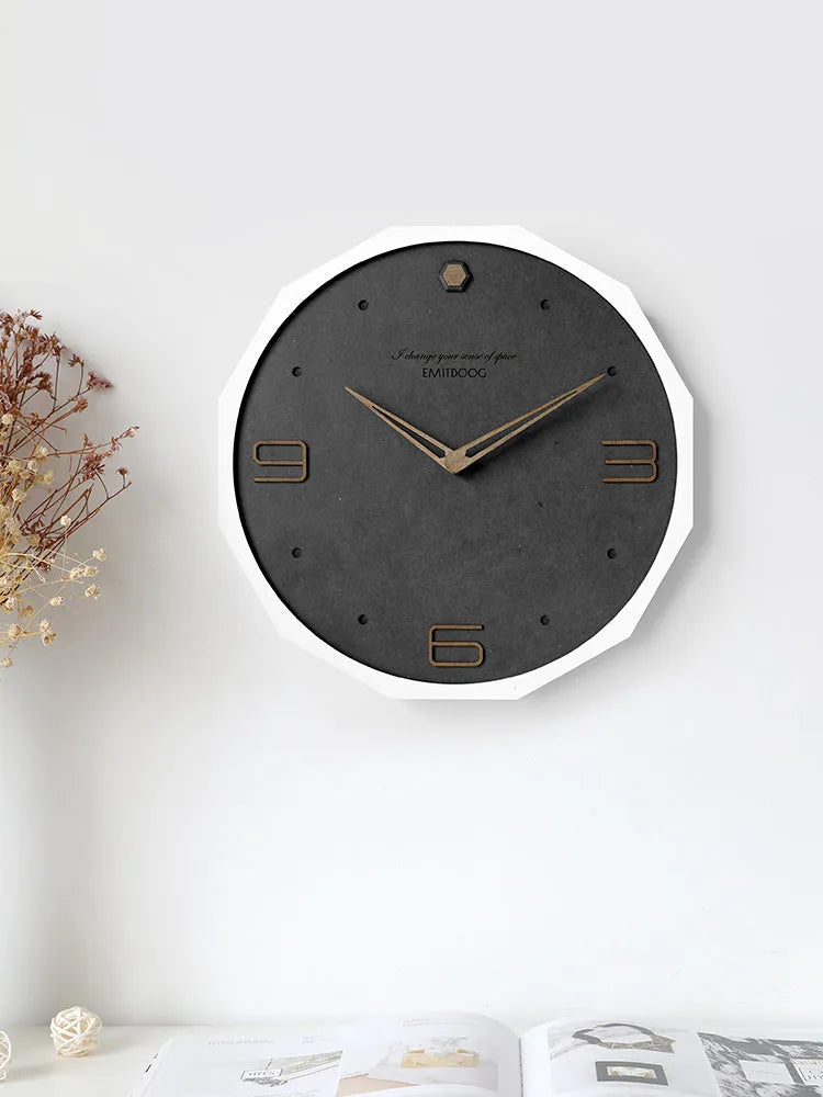 12 inch round Nordic minimalist wall clock with free-perforated Geralt mirror face on a wall