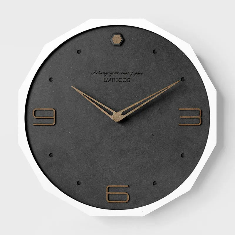 12 inch round Nordic minimalist wall clock with free-perforated Geralt mirror face on a wall