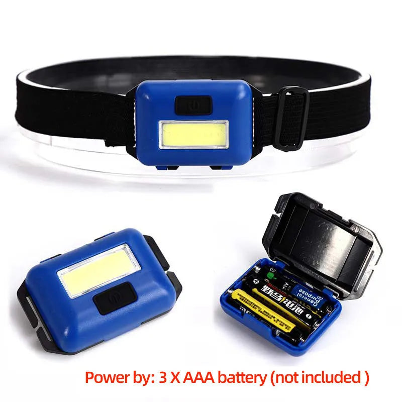 Compact outdoor mini COB LED headlight with adjustable polyester strap in black, blue, or red colour.