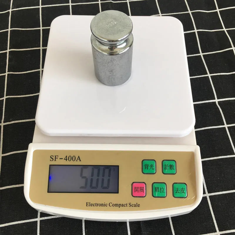 SF-400A electronic kitchen digital scale with 10kg capacity, shown on a kitchen worktop.