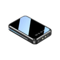 Mini digital display power bank in multiple colours showing capacity readout on screen