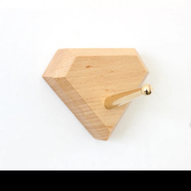 Beech wood adhesive wall hook with brass hook in five shapes: capsule, diamond, oval, round, and square