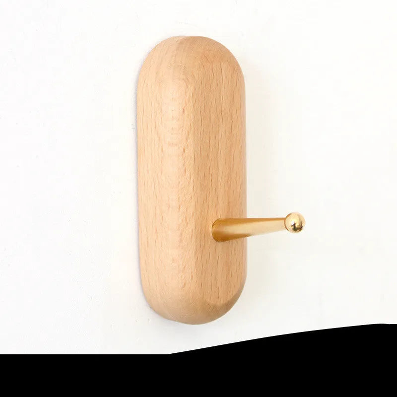 Beech wood adhesive wall hook with brass hook in five shapes: capsule, diamond, oval, round, and square