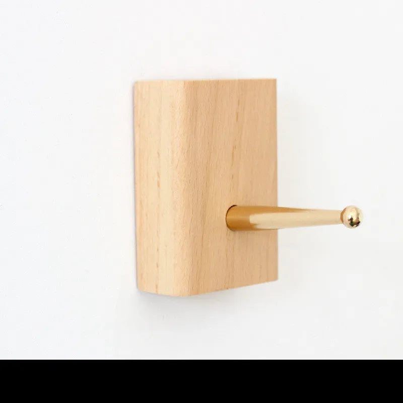 Beech wood adhesive wall hook with brass hook in five shapes: capsule, diamond, oval, round, and square