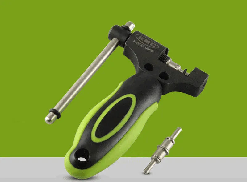 Green steel bicycle chain tool with double shaft chaining device and included chain driver for bike maintenance