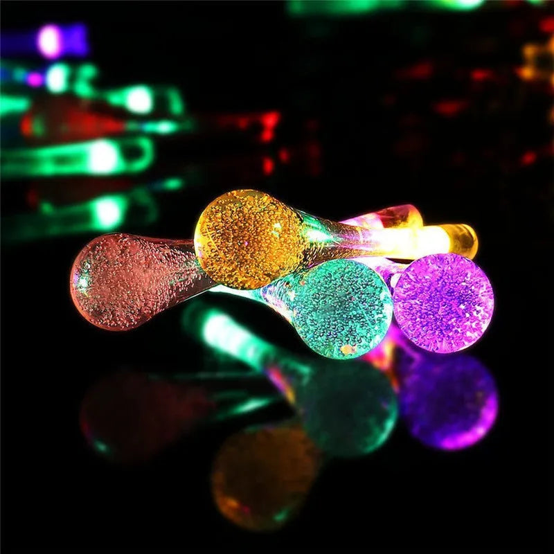 30 LED solar outdoor string lights with water drop pendants on 6.5m cable with ground spike