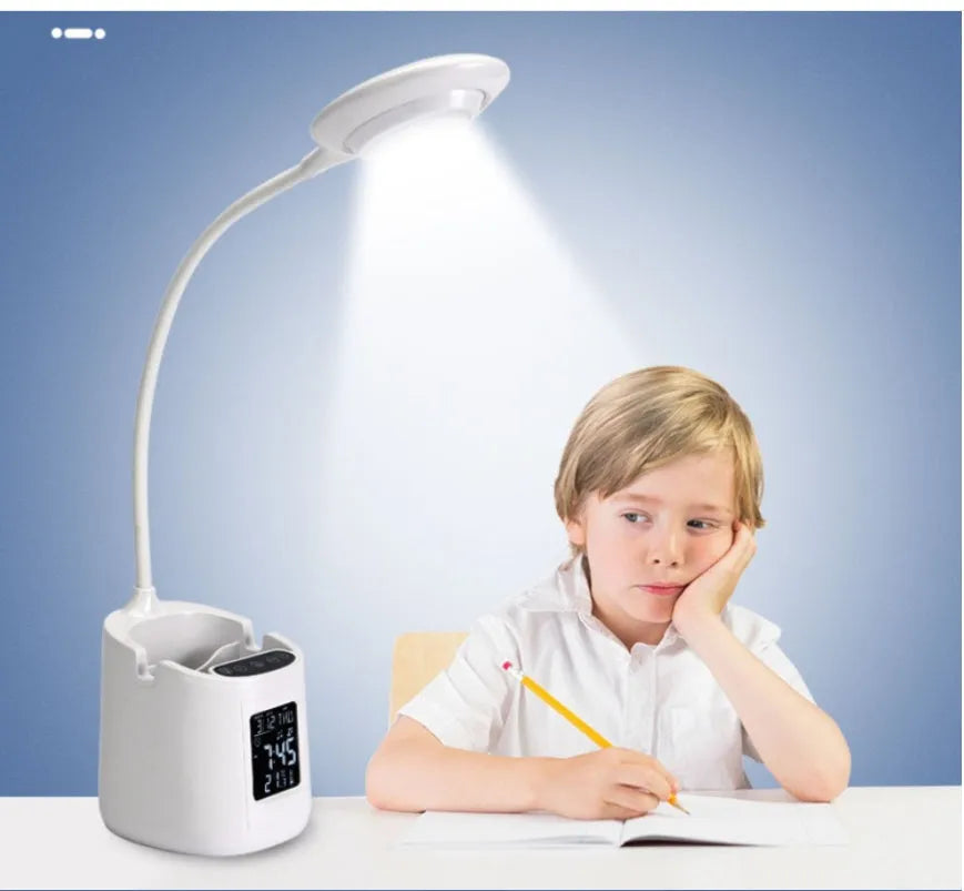 White USB rechargeable desk lamp with touch switch on a wooden desk.