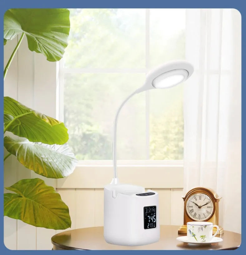 White USB rechargeable desk lamp with touch switch on a wooden desk.