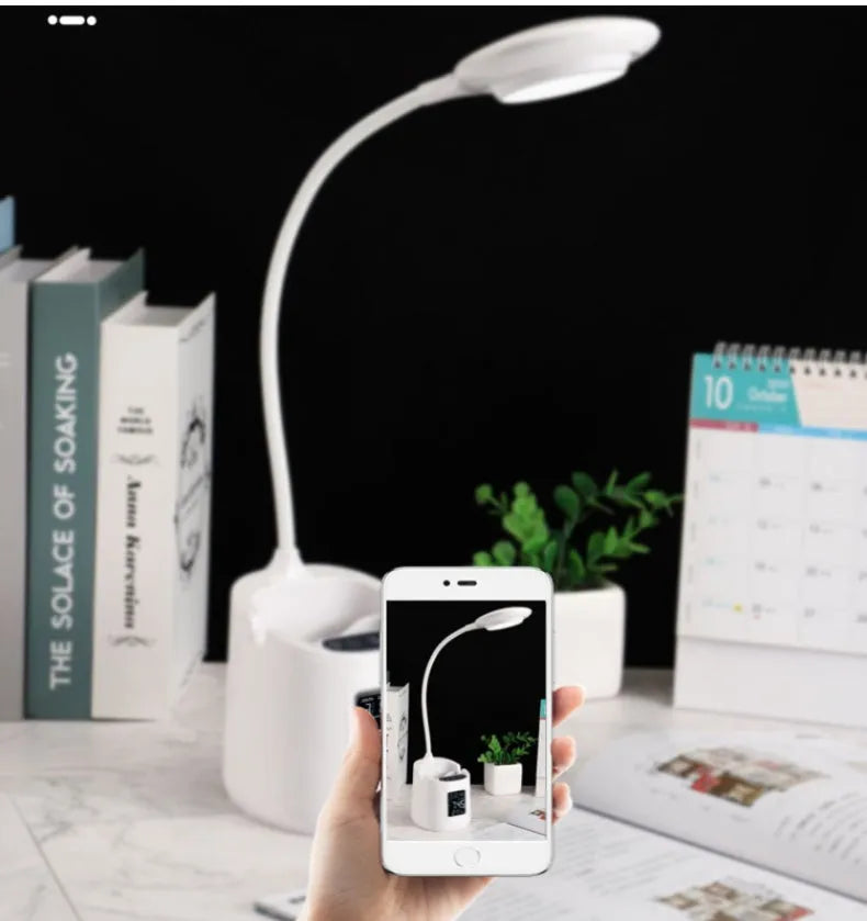 White USB rechargeable desk lamp with touch switch on a wooden desk.