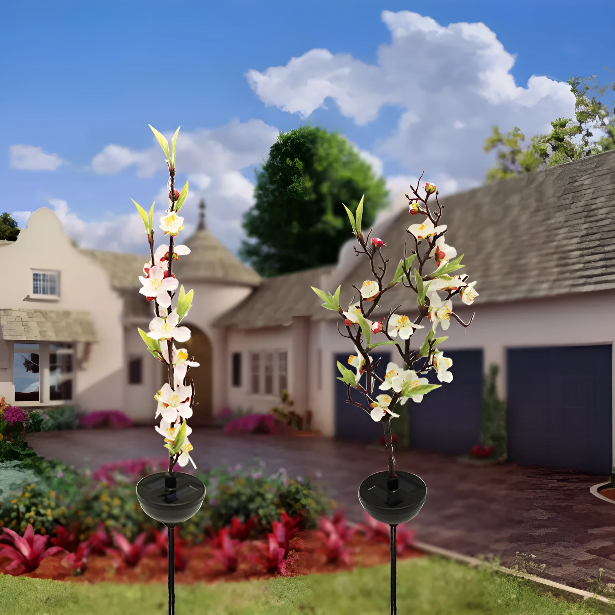 Solar-powered cherry firework string outdoor light with metal ground spike on a lawn.