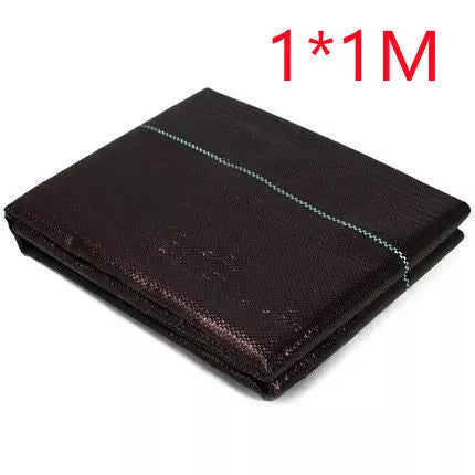 Black polyethylene woven weed-proof cloth laid flat on soil, showing its texture and size options for farmland.