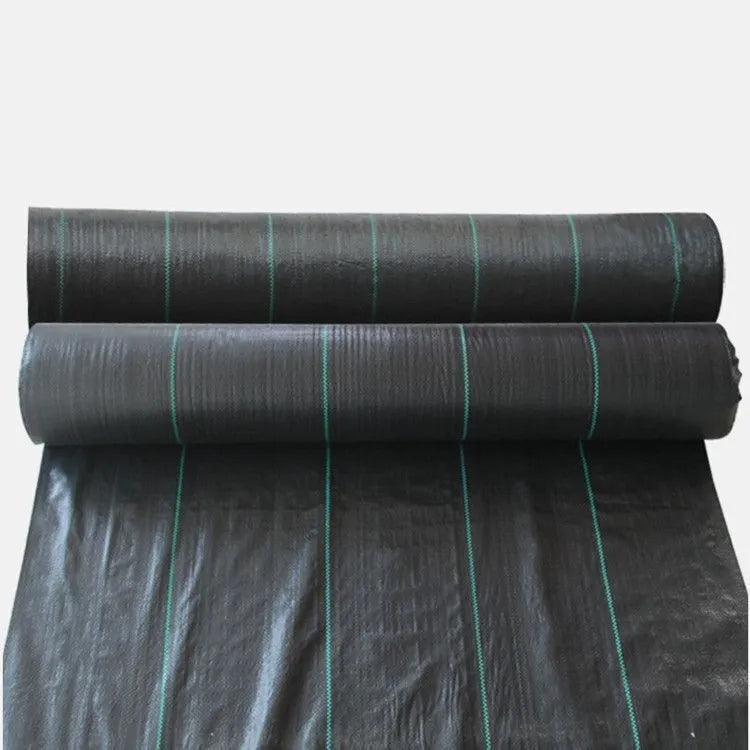 Black polyethylene woven weed-proof cloth laid flat on soil, showing its texture and size options for farmland.