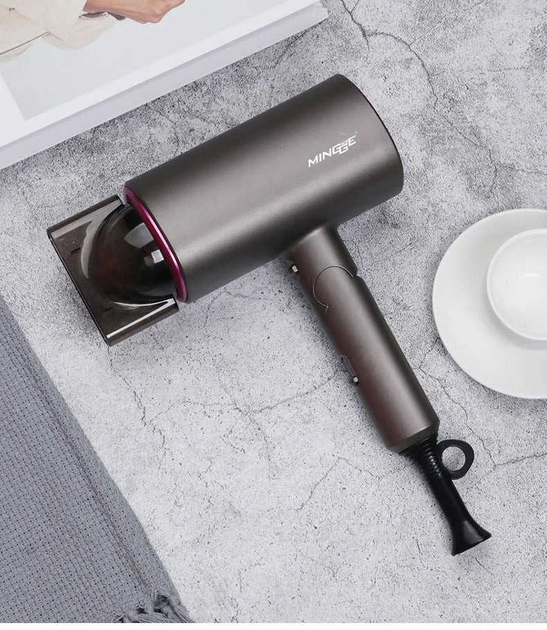 White 1600W negative ion hair dryer with concentrator nozzle and foldable handle on blue background