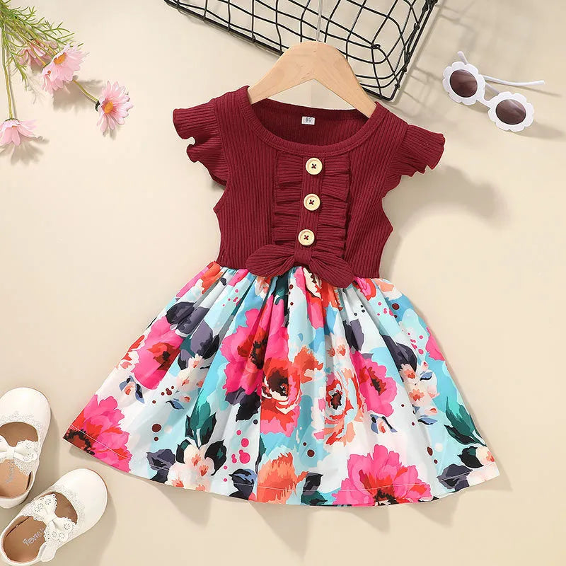 Sleeveless toddler girls summer dress on hanger, shown in available colours.