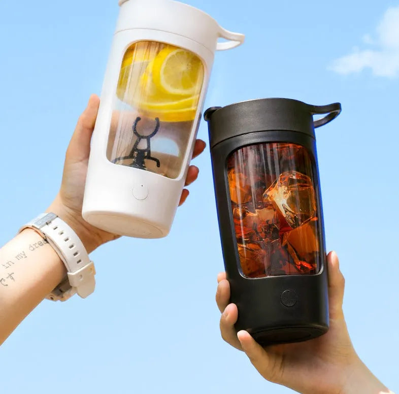 Portable juice blender cup in black, blue, pink, or white with 650ml capacity and compact design