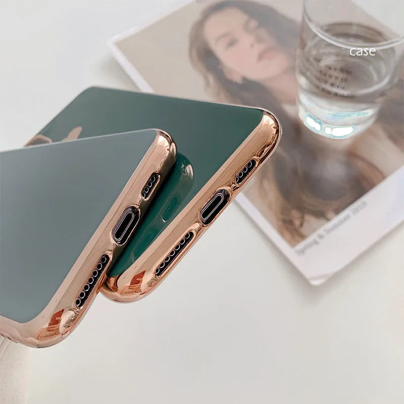 Slim solid colour TPU back cover case for iPhone on a table.