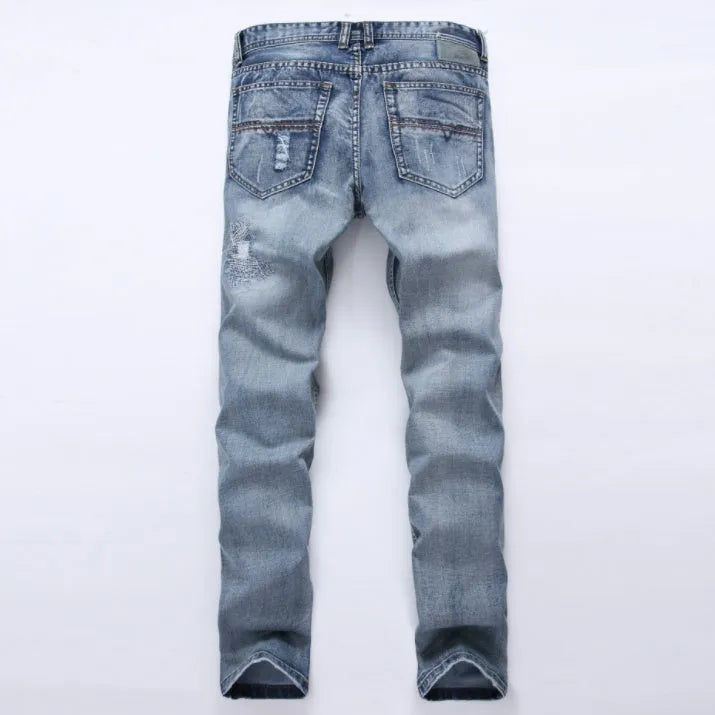 Mens light blue ripped slim fit jeans with distressed denim