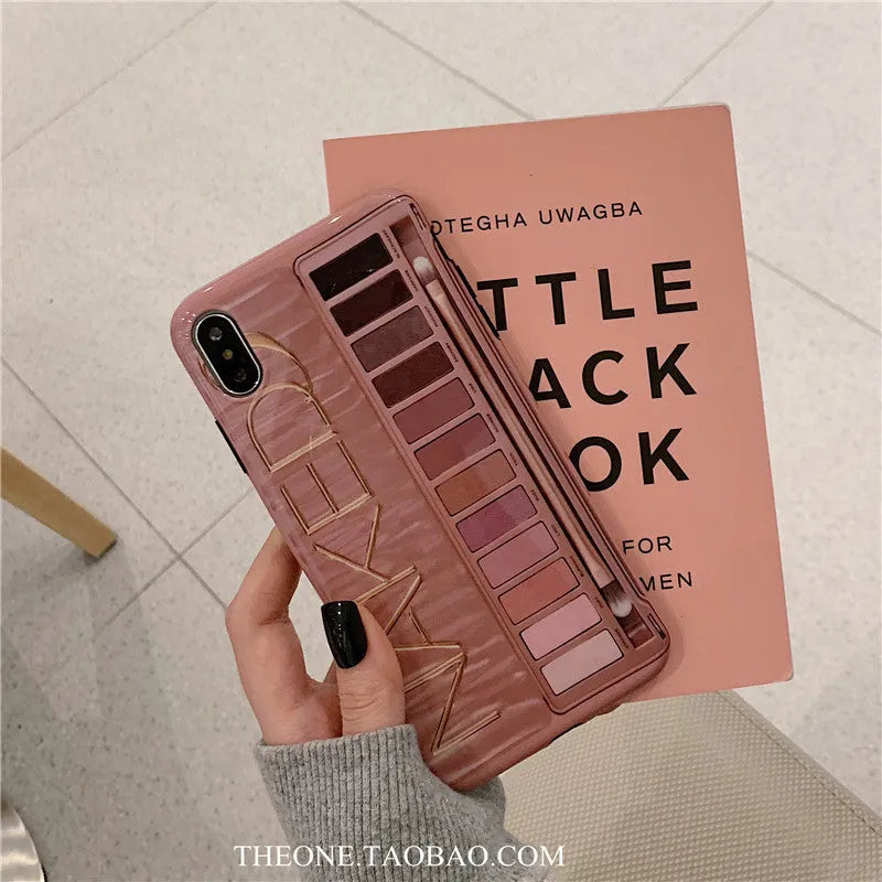 Silicone iPhone case with an eye shadow colour palette design, shown in Flesh and Grey colours.