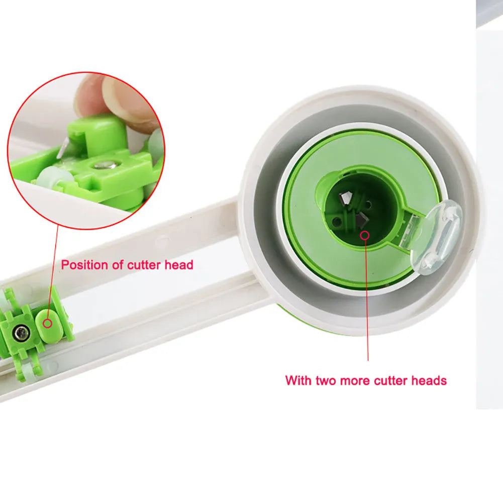 Orange or green plastic round paper cutter for A3 sheets on a colour box.