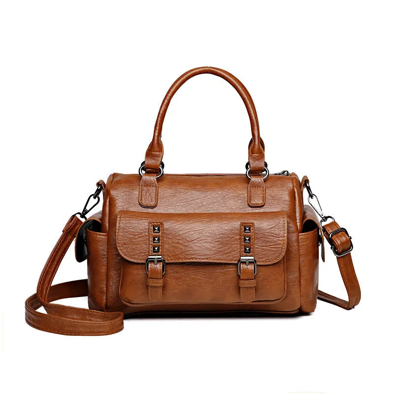 Vintage style square messenger bag in PU leather with visible stitching, shown in multiple colour options.