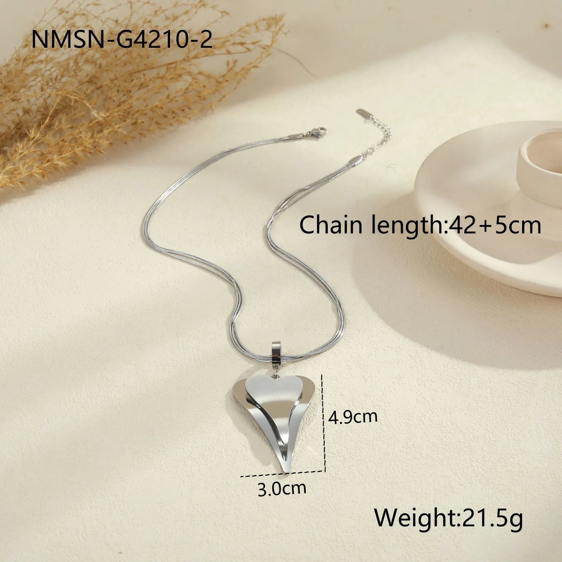 Geometric double heart and snake bones necklace in stainless steel with gold or steel finish on regular chain