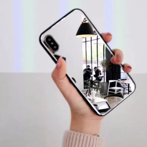 Black mirror back cover phone case for iPhone X showing reflective surface.
