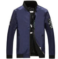 Men's reversible flight jacket in striped pattern with zipper closure shown in black colour