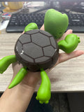 Turtle-shaped ABS plastic coaster in one of four colour options: dark green, light green, wheat starch, or yellow