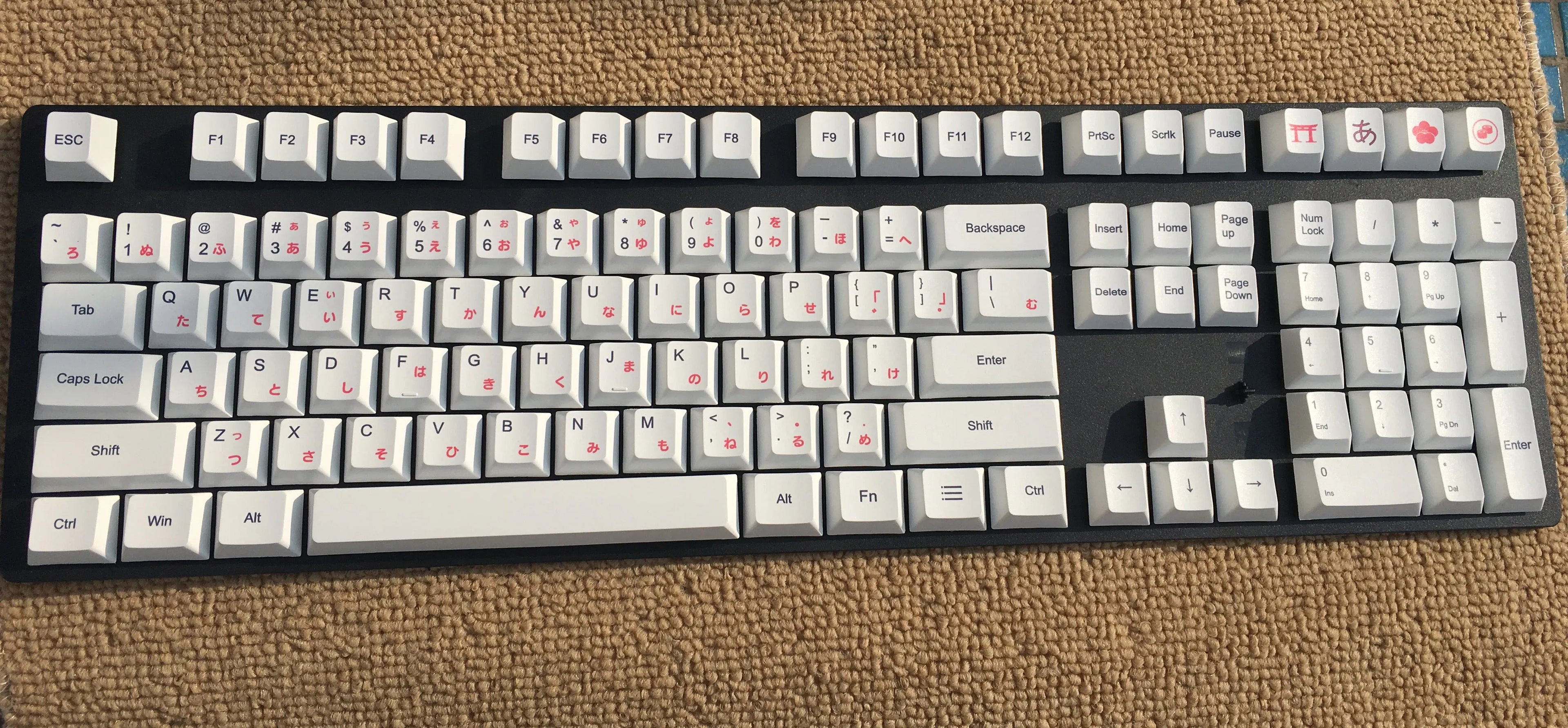 PBT thermal sublimation keycap set showing Japanese Russian Korean multilingual layouts with colour options