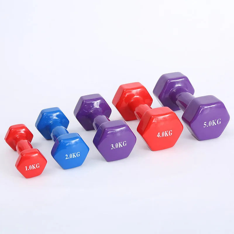 Bright coloured plastic-coated fitness dumbbells in 0.5kg, 1kg and 1.5kg weights for floor-protected workouts
