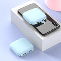 Portable 10000mAh power bank in black with multi-U port output and compact rectangular ABS shell design