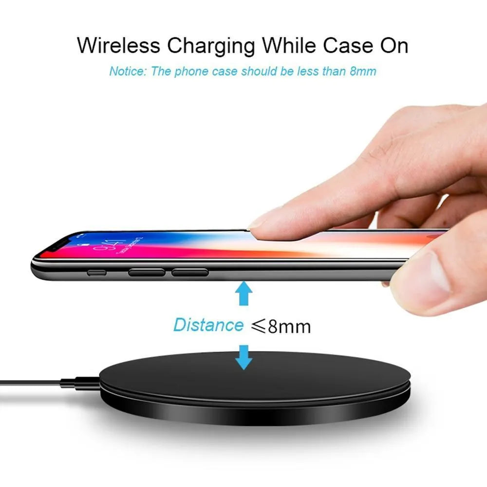 Black square GY-68 ultra-thin wireless fast charging pad on a desk.