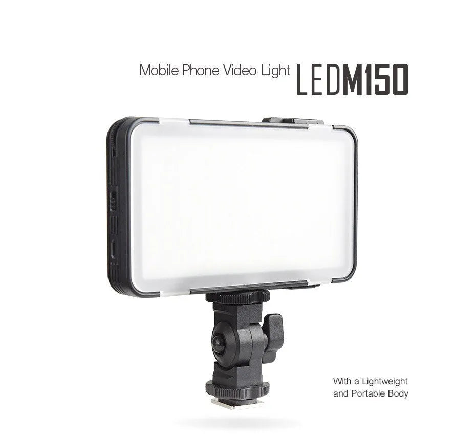 Slim silver Shenniu M150 LED video light with bracket on a mobile phone.