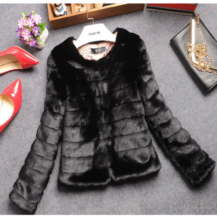 Women's short length faux fur top in beige on a model, showing regular sleeves and streetwear style.