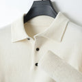 Men's wool polo collar pullover sweater in noble blue colour on a hanger