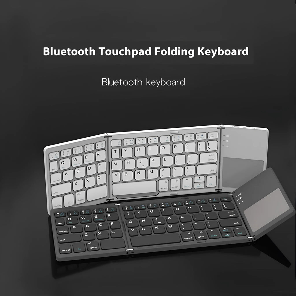 Black tri-fold Bluetooth keyboard unfolded, showing its thin profile and compact size next to a smartphone.