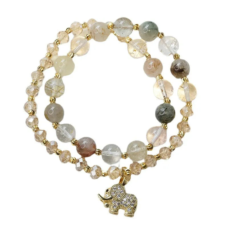 Women's retro bracelet with strawberry quartz hair crystal stones showing 521 colour variations