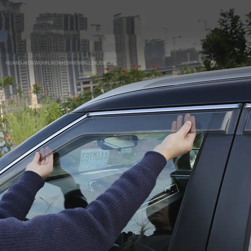 2023 Mitsubishi Outlander side window deflectors in black and translucent finishes